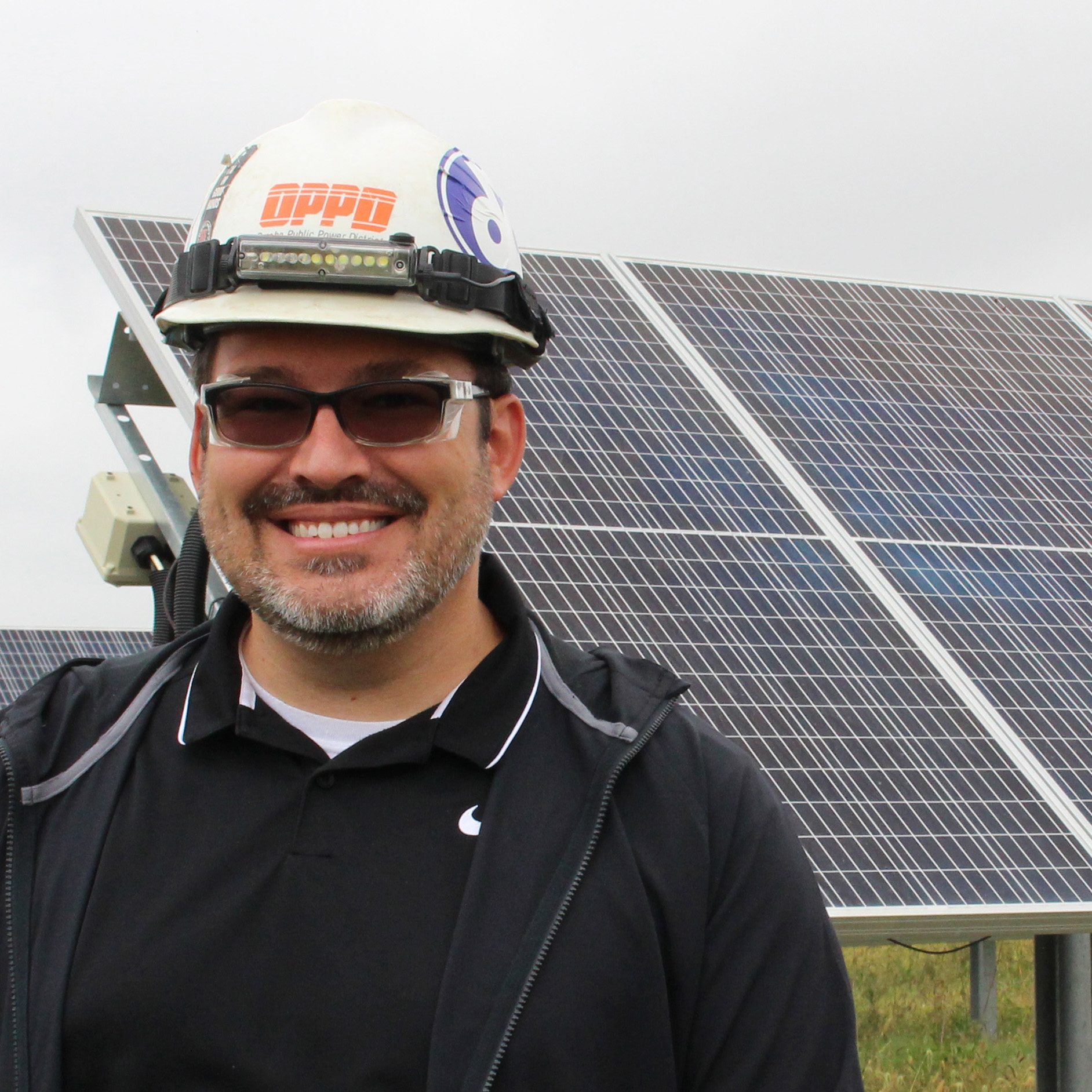 OPPD employee at community solar array
