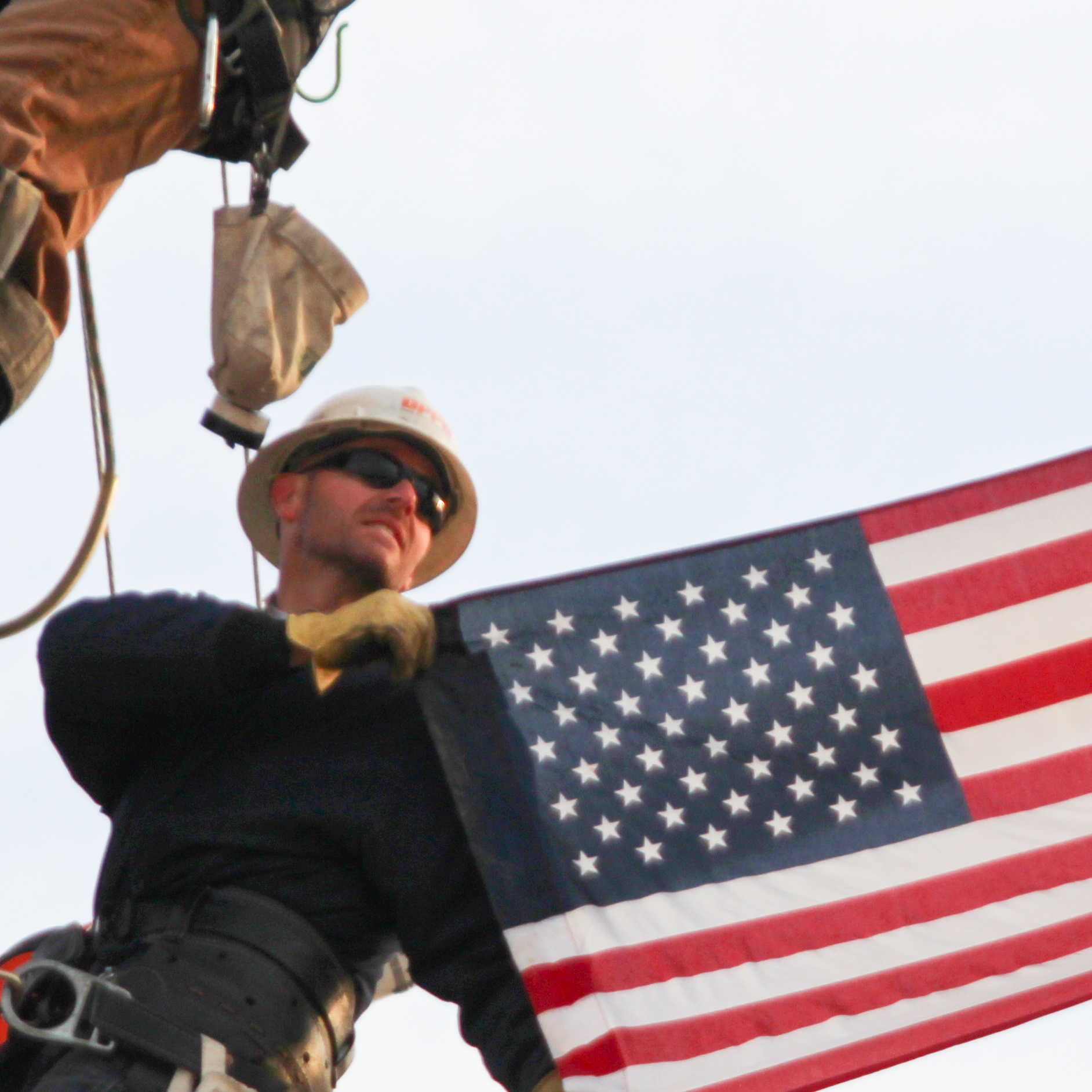 Lineworker with American flag